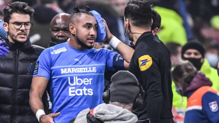 ligue-1:-lyon-vs.-marseille-will-not-resume-after-dimitri-payet-hit-on-head-by-bottle-from-crowd